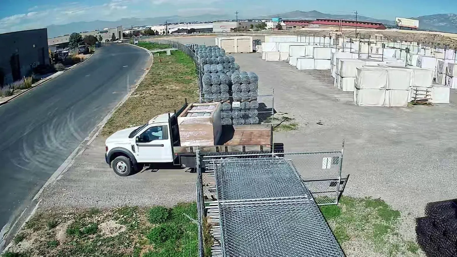 Truck at a materials yard gate, detected as a vehicle
