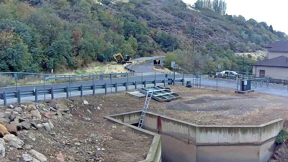 Daytime view of a concrete structure at a water project